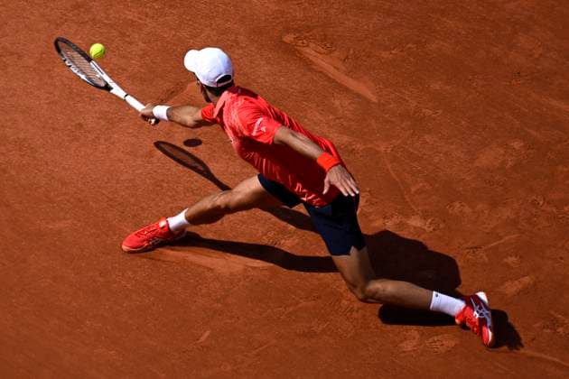(230607) -- PARIS, June 7, 2023 -- Novak Djokovic competes during the men s singles quarterfinal match between Novak Djokovic of Serbia and Karen Khachanov of Russia at the French Open tennis tournament at Roland Garros in Paris, France, on June 6, 2023. (Photo by Xinhua) (SP)FRANCE-PARIS-TENNIS-ROLAND GARROS-FRENCH OPEN-MEN S SINGLES JulienxMattia 