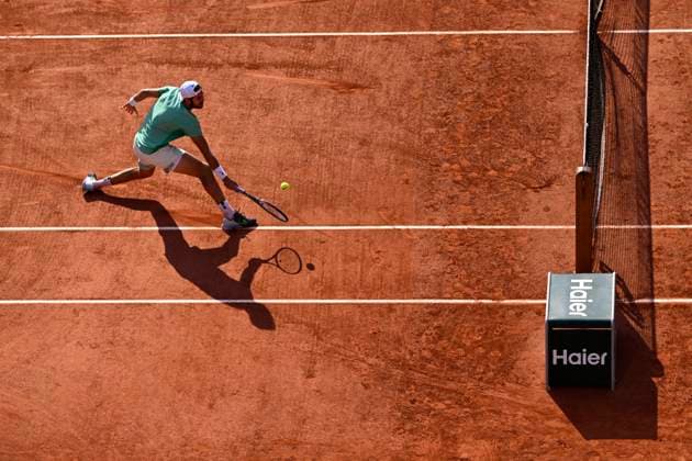 (230607) -- PARIS, June 7, 2023 -- Karen Khachanov competes during the men s singles quarterfinal match between Novak Djokovic of Serbia and Karen Khachanov of Russia at the French Open tennis tournament at Roland Garros in Paris, France, on June 6, 2023. (Photo by Xinhua) (SP)FRANCE-PARIS-TENNIS-ROLAND GARROS-FRENCH OPEN-MEN S SINGLES JulienxMattia 