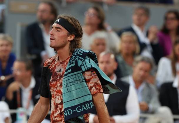 (230607) -- PARIS, June 7, 2023 -- Stefanos Tsitsipas reacts during the men s singles quarterfinal match between Carlos Alcaraz of Spain and Stefanos Tsitsipas of Greece at the French Open tennis tournament at Roland Garros in Paris, France, on June 6, 2023. ) (SP)FRANCE-PARIS-TENNIS-ROLAND GARROS-FRENCH OPEN-MEN S SINGLES GaoxJing 