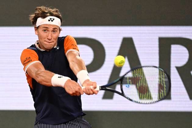 (230608) -- PARIS, June 8, 2023 -- Casper Ruud competes during the men s singles quarterfinal match between Casper Ruud of Norway and Holger Rune of Denmark at the French Open tennis tournament at Roland Garros in Paris, France, on June 7, 2023. (Photo by Xinhua) (SP)FRANCE-PARIS-TENNIS-ROLAND GARROS-FRENCH OPEN-MEN S SINGLES JulienxMattia 