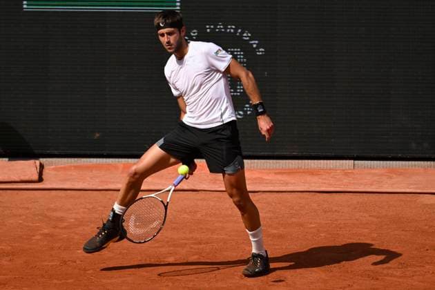 (230608) -- PARIS, June 8, 2023 -- Tomas Martin Etcheverry competes during the men s singles quarterfinal match between Alexander Zverev of Germany and Tomas Martin Etcheverry of Argentina at the French Open tennis tournament at Roland Garros in Paris, France, on June 7, 2023. (Photo by Xinhua) (SP)FRANCE-PARIS-TENNIS-ROLAND GARROS-FRENCH OPEN-MEN S SINGLES JulienxMattia 