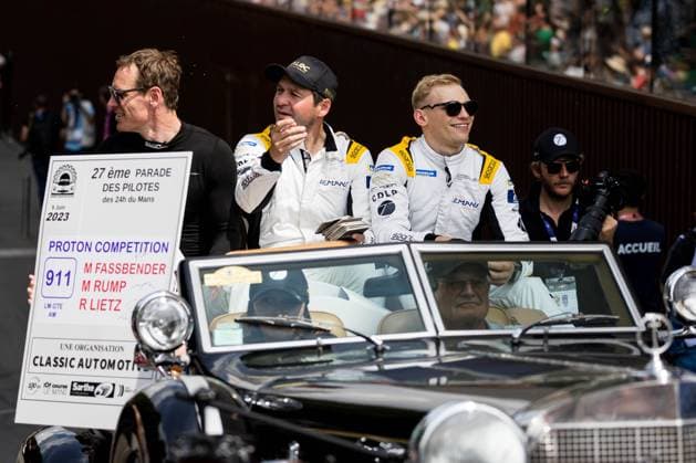 MOTORSPORTS - WEC 2023 LE MANS,FRANCE,09.Jun.23 - MOTORSPORTS - WEC, FIA World Endurance Championships, 24 Hours of Le Mans, drivers parade. Image shows Michael Fassbender (IRL), Martin Rump (EST) and Richard Lietz (AUT Proton Competition).  GEPAxpictures xMatthiasxTrinkl