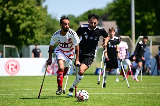 Sportart I Mixed I Saison 2022 2023 I Amputierten-Fußball Bundesliga I 3. Spieltag I SG Nord-Ost Fortuna Düsseldorf I 10.06.2023 Radouane Chaanoune (7, Fortuna Düsseldorf) gegen Hamed Sagar (5, SG Nord-Ost) Hamburg Paul-Hauenschild-Sportanlage Schleswig-Holstein Deutschland