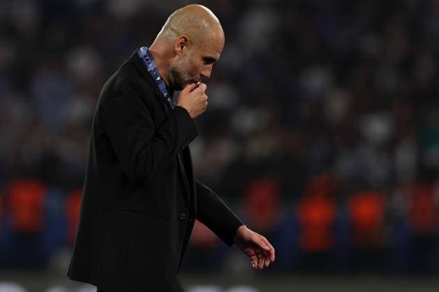 10th June 2023, Ataturk Olympic Stadium, Istanbul, Turkey; UEFA Champions League Final, Manchester City versus Inter Milan; Manchester City Manager Josep Guardiola kisses his winners medal  ActionPlus12518916 ShaunxBrooks
