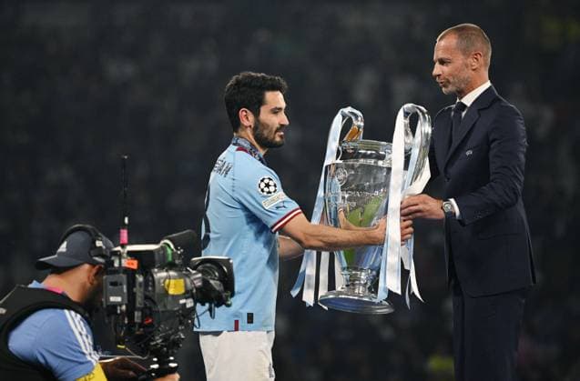 Turkey Soccer Champions League Manchester City - Inter 8453102 11.06.2023 Manchester City s Ilkay Guendogan is presented with the European Cup trophy from President of UEFA Aleksander Ceferin after the team s victory in the UEFA Champions League final soccer match between Manchester City and Inter Milan at Ataturk Olympic stadium, in Istanbul, Turkey. Alexey Filippov Sputnik Istanbul Turkey  Copyright: xAlexeyxFilippovx