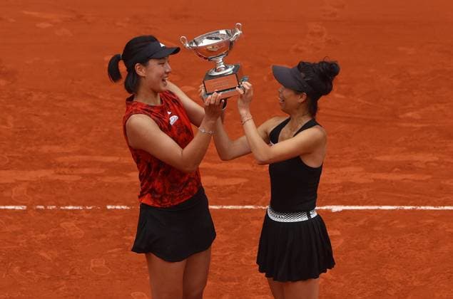 Mandatory Credit: Photo by Ella Ling Shutterstock (13949291k) Xinyu Wang of China and Su-Wei Hsieh of Taipei celebrate with the trophy French Open Tennis, Day 15, Roland Garros, Paris, France - 11 June 2023 French Open Tennis, Day 15, Roland Garros, Paris, France - 11 June 2023  Copyright: xEllaxLing Shutterstockx 13949291k