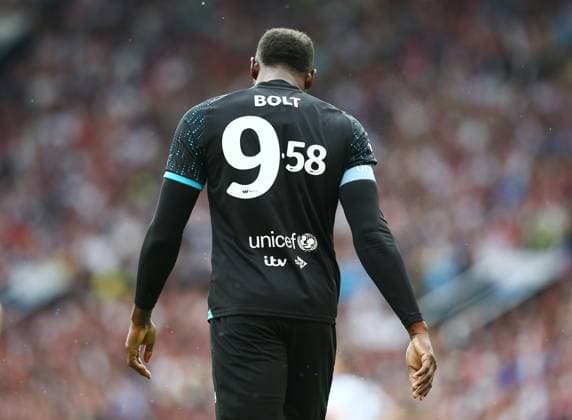 Mandatory Credit: Photo by Matt West Shutterstock (13949253p) Usain Bolt of Soccer Aid World XI 9.58 shirt back England XI v World XI, Soccer Aid for Unicef 2023, Football, Old Trafford, Manchester, UK - 11 Jun 2023 EDITORIAL USE ONLY No use with unauthorised audio, video, data, fixture lists, club league logos or live services. Online in-match use limited to 120 images, no video emulation. No use in betting, games or single club league player publications. England XI v World XI, Soccer Aid for Unicef 2023, Football, Old Trafford, Manchester, UK - 11 Jun 2023 EDITORIAL USE ONLY No use with unauthorised audio, video, data, fixture lists, club league logos or live services. Online in-match use limited to 120 images, no video emulation. No use in betting, games or single club league player publications.  Copyright: xMattxWest Shutterstockx 13949253p
