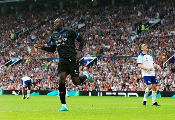 Mandatory Credit: Photo by Matt West Shutterstock (13949253s) Usain Bolt of Soccer Aid World XI celebrates scoring the opening goal England XI v World XI, Soccer Aid for Unicef 2023, Football, Old Trafford, Manchester, UK - 11 Jun 2023 EDITORIAL USE ONLY No use with unauthorised audio, video, data, fixture lists, club league logos or live services. Online in-match use limited to 120 images, no video emulation. No use in betting, games or single club league player publications. England XI v World XI, Soccer Aid for Unicef 2023, Football, Old Trafford, Manchester, UK - 11 Jun 2023 EDITORIAL USE ONLY No use with unauthorised audio, video, data, fixture lists, club league logos or live services. Online in-match use limited to 120 images, no video emulation. No use in betting, games or single club league player publications.  Copyright: xMattxWest Shutterstockx 13949253s