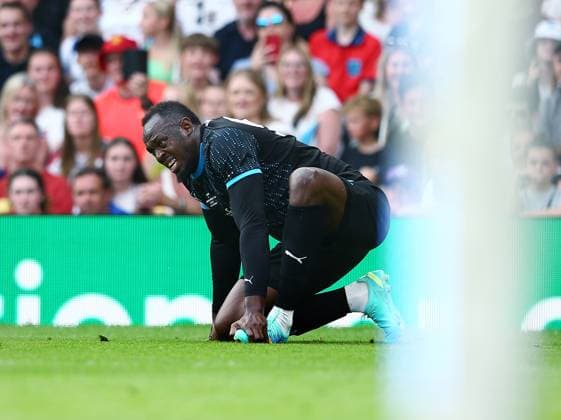 Mandatory Credit: Photo by Matt West Shutterstock (13949253ab) Usain Bolt of Soccer Aid World XI feels the pain from a knock England XI v World XI, Soccer Aid for Unicef 2023, Football, Old Trafford, Manchester, UK - 11 Jun 2023 EDITORIAL USE ONLY No use with unauthorised audio, video, data, fixture lists, club league logos or live services. Online in-match use limited to 120 images, no video emulation. No use in betting, games or single club league player publications. England XI v World XI, Soccer Aid for Unicef 2023, Football, Old Trafford, Manchester, UK - 11 Jun 2023 EDITORIAL USE ONLY No use with unauthorised audio, video, data, fixture lists, club league logos or live services. Online in-match use limited to 120 images, no video emulation. No use in betting, games or single club league player publications.  Copyright: xMattxWest Shutterstockx 13949253ab