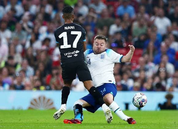 Mandatory Credit: Photo by Matt West Shutterstock (13949253ar) Alex Brooker of Soccer Aid England and Nani of Soccer Aid World XI England XI v World XI, Soccer Aid for Unicef 2023, Football, Old Trafford, Manchester, UK - 11 Jun 2023 EDITORIAL USE ONLY No use with unauthorised audio, video, data, fixture lists, club league logos or live services. Online in-match use limited to 120 images, no video emulation. No use in betting, games or single club league player publications. England XI v World XI, Soccer Aid for Unicef 2023, Football, Old Trafford, Manchester, UK - 11 Jun 2023 EDITORIAL USE ONLY No use with unauthorised audio, video, data, fixture lists, club league logos or live services. Online in-match use limited to 120 images, no video emulation. No use in betting, games or single club league player publications.  Copyright: xMattxWest Shutterstockx 13949253ar