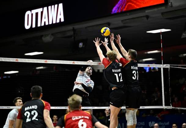 June 11, 2023, Ottawa, ON, CAN: Canada s Stephen Timothy Maar (7) spikes the ball above the block of Germany s Anton Brehme (12) and Yan Bohme (31) during Volleyball Nations League action in Ottawa, on Sunday, June 11, 2023. Stephen Timothy Maar, Anton Brehme, Yan Bohme  - ZUMAc35_ 20230611_zaf_c35_170 Copyright: xJustinxTangx
