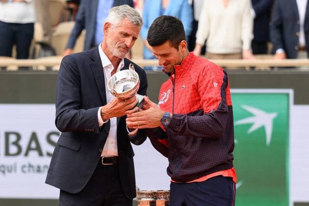Novak Djokovic Wins Final Of French Open Gilles Moretton and Novak Djokovic of Serbia with the trophy after winning his men s singles final match against Casper Ruud during the French Open 2021 at Roland Garros on June 11, 2023 in Paris, France. Photo by Laurent Zabulon ABACAPRESS.COM Paris France  Copyright: xZabulonxLaurent ABACAx 856639_025 ZabulonxLaurent ABACAx 856639_025
