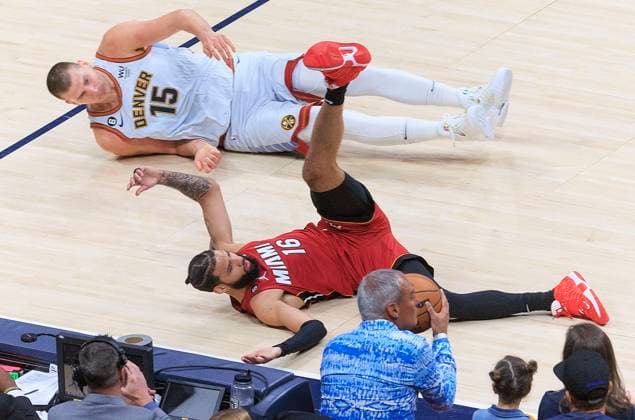Sport Themen der Woche KW24 Sport Bilder des Tages June 12, 2023, Denver, Colorado, USA: CALEB MARTIN 16 of the Miami Heat and NIKOLA JOKIC 15 of the Denver Nuggets fall to the floor during Game 5 of the 2023 NBA, Basketball Herren, USA Finals game on Monday at Ball Arena in Denver, Colorado. Denver USA - ZUMAp124 20230612_zaa_p124_019 Copyright: xJavierxRojasx