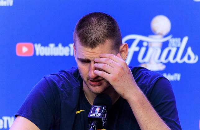 June 12, 2023, Denver, Colorado, USA: Nikola Jokic 15 of the Denver Nuggets during a press conference, PK, Pressekonferenz after being reminded of the upcoming parade celebration for winning Game 5 of the 2023 NBA, Basketball Herren, USA Finals game against the Miami Heat on Monday June 12, 2023 at Ball Arena in Denver, Colorado. Nuggets defeat Heat, 94-89. PI Denver USA - ZUMAp124 20230612_zaa_p124_067 Copyright: xJAVIERxROJASx