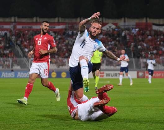 VALLETTA, MALTA - JUNE 16: James Maddison of England jumps over a tackle during the UEFA EURO, EM, Europameisterschaft,Fussball 2024 qualifying round group C match between Malta and England at Ta Qali Stadium on June 16, 2023 in Valletta, Malta. SPO 