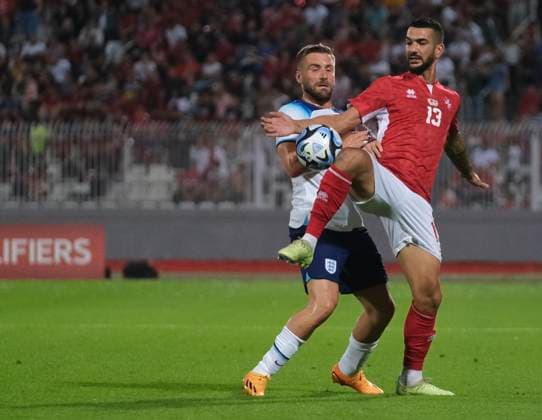VALLETTA, MALTA - JUNE 16: Ferdinando Apap of Malta battles with Luke Shaw of England during the UEFA EURO, EM, Europameisterschaft,Fussball 2024 qualifying round group C match between Malta and England at Ta Qali Stadium on June 16, 2023 in Valletta, Malta. SPO 