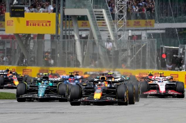 June 18, 2023, Montreal, PQ, CANADA: Red Bull Racing Max Verstappen, of the Netherlands, leads the pack during Formula One auto racing action at the Canadian Grand Prix in Montreal, Sunday, June 18, 2023. FBO CFL GREY CUP  - ZUMAc35_ 20230618_zaf_c35_028 Copyright: xRyanxRemiorzx