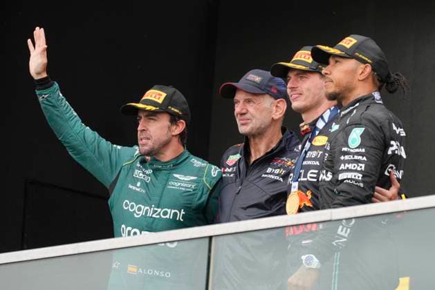 June 18, 2023, MONTREAL, QC, CANADA: Second place finisher Aston Martin driver Fernando Alonso, left to right, of Spain, Adrian Newey, Red Bull Racing chief technology officer, and winner Max Verstappen of the Netherlands and third place finisher Mercedes driver Lewis Hamilton of Great Britain celebrate on the podium following the Canadian Grand Prix Sunday, June 18, 2023 in Montreal. Canada News - June 18, 2023 - ZUMAc35_ 20230618_zaf_c35_061 Copyright: xChristinnexMuschix
