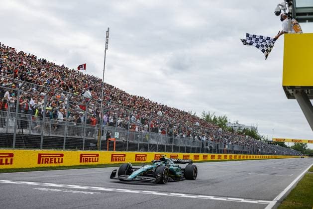 14 ALONSO Fernando (spa), Aston Martin F1 Team AMR23, action checkered flag, drapeau during the Formula 1 Pirelli Grand Prix du Canada, 8th round of the 2023 Formula One World Championship, WM, Weltmeisterschaft from June 16 to 18, 2023 on the Circuit Gilles Villeneuve, in MontrÃ al, Canada - F1 - CANADIAN GRAND PRIX 2023 - RACE DPPI Panoramic  00123021__R5_0822