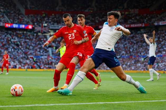 Manchester, England, June 19th 2023: Harry Maguire (6 England) tackles Ilija Nestorovski (23 North Macedonia) during the UEFA 2024 European Qualifiers football match between England and North Macedonia at Old Trafford in Manchester, England. (James Whitehead SPP) Copyright: xJamesxWhiteheadx xSPPx spp-en-JaWhSp-ENGvMKD057