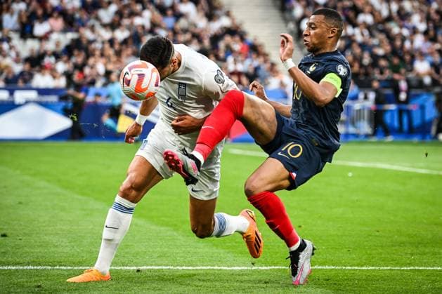 June 19, 2023, Saint-Denis, France, France: Konstantinos MAVROPANOS of Greece and Kylian MBAPPE of France during the UEFA EURO, EM, Europameisterschaft,Fussball 2024 European Qualifiers Group B match between France and Greece at Stade de France on June 19, 2023 in Saint-Denis near Paris, France. Saint-Denis France - ZUMAm308 20230619_zsp_m308_002 Copyright: xMatthieuxMirvillex