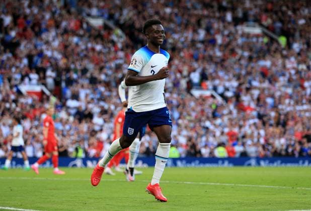 Mandatory Credit: Photo by JASONPIX Shutterstock (13975662e) Bukayo Saka of England celebrates after he scores a goal to put England 2-0 up England v North Macedonia - European Championship, EM, Europameisterschaft QUALIFYING - GROUP C. Football, Old Trafford, Manachester. UK. 19 JUN 2023 Editorial use only England v North Macedonia - EUROPEAN CHAMPIONSHIP QUALIFYING - GROUP C. Football, Old Trafford, Manachester. UK. 19 JUN 2023 Editorial use only  Copyright: xJASONPIX Shutterstockx 13975662e