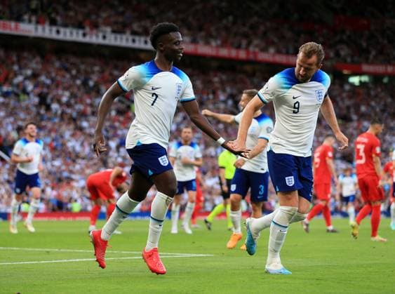 Mandatory Credit: Photo by JASONPIX Shutterstock (13975662b) Bukayo Saka of England celebrates with Harry Kane after he scores a goal to put England 2-0 up England v North Macedonia - European Championship, EM, Europameisterschaft QUALIFYING - GROUP C. Football, Old Trafford, Manachester. UK. 19 JUN 2023 Editorial use only England v North Macedonia - EUROPEAN CHAMPIONSHIP QUALIFYING - GROUP C. Football, Old Trafford, Manachester. UK. 19 JUN 2023 Editorial use only  Copyright: xJASONPIX Shutterstockx 13975662b