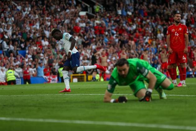 Bukayo Saka wheels away after scoring for England Copyright: xSimonxHallx 37600044