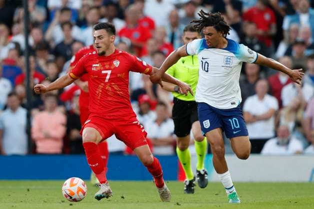 England v North Macedonia UEFA EURO, EM, Europameisterschaft,Fussball 2024 Qualifiers Eljif Elmas of North Macedonia and Trent Alexander-Arnold of England in action during the UEFA Euro 2024 Qualifiers Group C match at Old Trafford, Manchester Copyright: xPaulxChestertonx FIL-18631-0134 UK Newspapers OUT