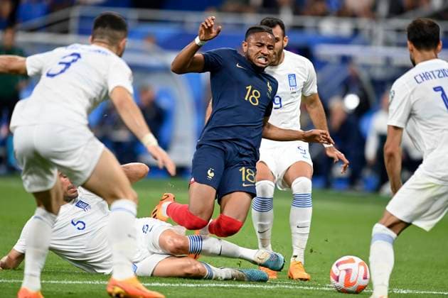 France v Greece: Group B - UEFA EURO, EM, Europameisterschaft,Fussball 2024 Qualifying Round Andreas Bouchalakis of Greece tackles Christopher Nkunku of France during the UEFA EURO 2024 Qualifying Round Group B match between France and Greece at Stade de France on June 19, 2023 in Paris, France. Paris Stade de France France France Copyright: xRichardxSellers Sportsphoto APLx 13950637