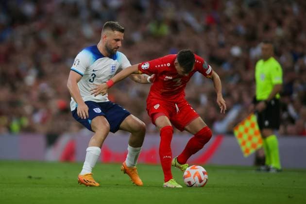 Luke Shaw of England fights for the ball Copyright: xSimonxHallx 37600074