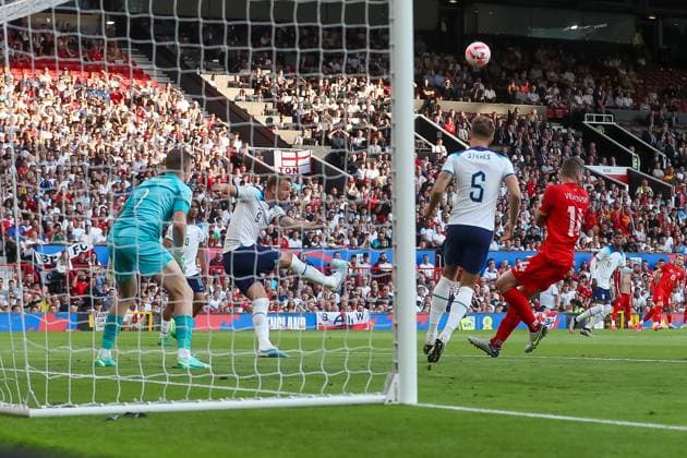 Harry Kane clears the ball for England Copyright: xSimonxHallx 37600079