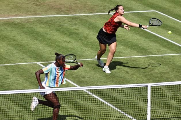 Jule Niemeier (red) and Noma Noha Akugue (black), GER, during womens doubles at 2023 bett1 Open in Berlin, 21 06 2023; -