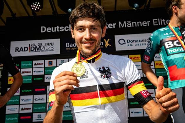BUCHMANN Emanuel: National Championships Road cycling, Rad, Radsport, Strasse 2023 - RR Elite Men BUCHMANN Emanuel ( GER ) - Winner - First Place BORA - HANSGROHE ( BOH ) - GER Award Ceremony Medal Ceremony Podium - Querformat - quer - horizontal - Landscape - Event Veranstaltung: National Championships - Road Cycling - Category Kategorie: Cycling - Road Cycling - Elite Men - Location Ort: Europe Germany - Baden Württemberg - Start: Donaueschingen - Finish - Bad Dürrheim ( Baden Württemberg ) - Discipline: Road Race ( RR ) - National Championships - Distance: 215 km - Date Datum: 25.06.2023 Sunday -