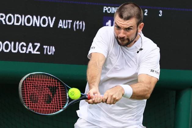 TENNIS - Wimbledon 2023 LONDON,ENGLAND,26.JUN.23 - TENNIS - ATP, Tennis Herren World Tour, Wimbledon, Grand Slam, qualification. Image shows Jurij Rodionov (AUT).  GEPAxpictures xAlanxGrieves