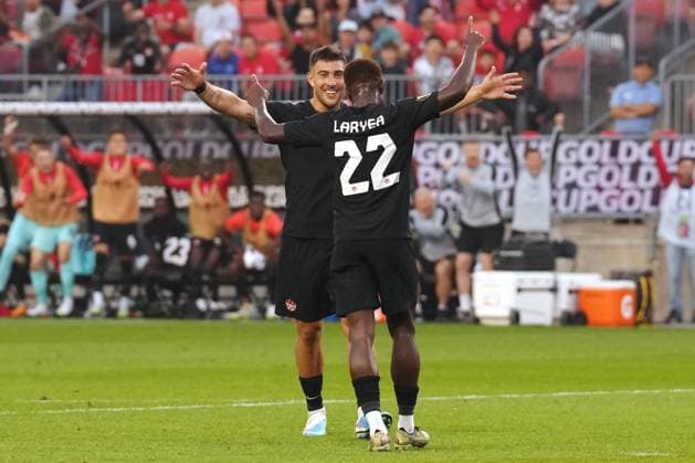 June 27, 2023, TORONTO, ON, CAN: Canada s Richie Laryea (22) celebrates his goal against Guadeloupe with teammate Lucas Cavallini (9) during second half CONCACAF Gold Cup group stage action in Toronto, on Tuesday, June 27, 2023. Canada News - June 27, 2023  - ZUMAc35_ 20230627_zaf_c35_123 Copyright: xChrisxYoungx