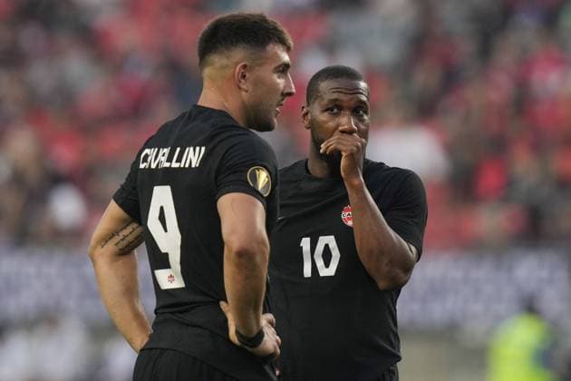 June 27, 2023, TORONTO, ON, CAN: Canada s Lucas Cavallini (left) and Junior Hoilett confer over a free kick during second half CONCACAF Gold Cup group stage action against Guadeloupe, in Toronto, on Tuesday, June 27, 2023. Lucas Cavallini ; Junior Hoilett  - ZUMAc35_ 20230627_zaf_c35_134 Copyright: xChrisxYoungx