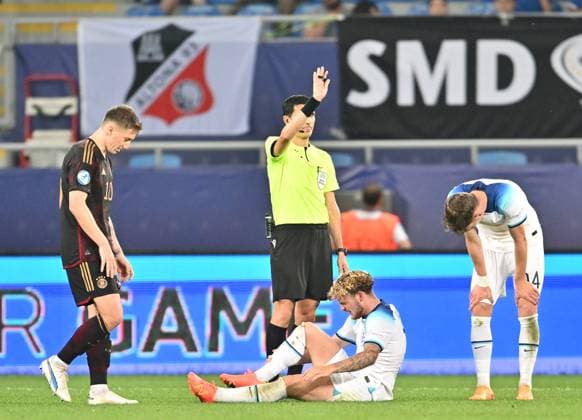 BATUMI, GEORGIA - JUNE 28: Referee Aliyar Aghayev gestures as Harvey Elliott of England holds his leg whilst injured during the UEFA Under-21 Euro 2023 Group C match between England and Germany at Adjarabet Arena on June 28, 2023 in Batumi, Georgia. SPO 