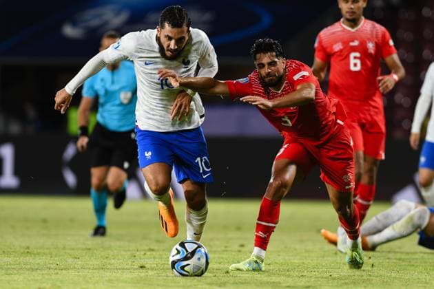 Switzerland v France - U21, U 21 EURO 2023 Rayan Cherki (L) and Nicolas Vouilloz (R) in action during UEFA European Under-21 Championship Group D: Switzerland U21 vs France U21, disputed on Dr Constantin Radulescu Stadium, 28 June 2023 Cluj-Napoca Romania  Copyright: xFlaviuxBuboix originalFilename:buboi-notitle230628_np7Eu.jpg