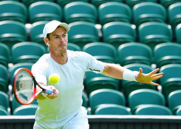 Mandatory Credit: Photo by Javier Garcia Shutterstock (13987384h) Andy Murray practices on Centre Court wearing an ear bud Wimbledon Tennis Championship Practice and Previews, The All England Lawn Tennis and Croquet Club, London, UK - 29 Jun 2023 Wimbledon Tennis Championship Practice and Previews, The All England Lawn Tennis and Croquet Club, London, UK - 29 Jun 2023  Copyright: xJavierxGarcia Shutterstockx 13987384h