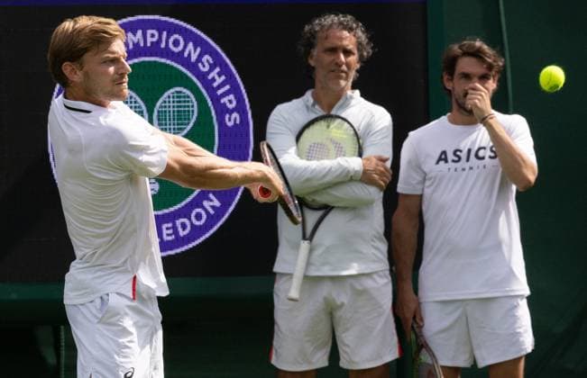 Belgian David Goffin, Goffin s coach Yannis Demeroutis and Goffin s coach Germain Gigounon pictured during a training session ahead of the 2023 Wimbledon grand slam tennis tournament at the All England Tennis Club, in south-west London, Britain, Thursday 29 June 2023. BENOITxDOPPAGNE  x69688118x