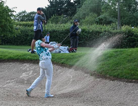 29th June 2023; The Belfry, Sutton Coldfield, West Midlands, England: Betfred British Masters Golf, Day 1; Robert MacIntyre (SCO) explodes out of the bunker  ActionPlus12525030 GodfreyxPitt