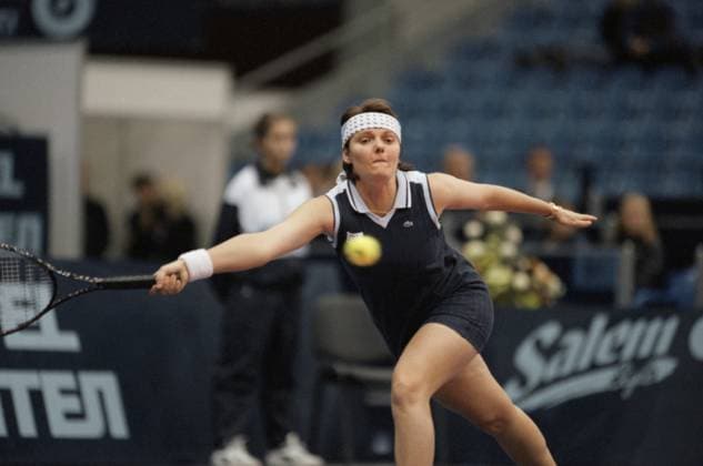 Moscow, Russia. French tennis player Nathalie Tauziat competes in the semi-final match against American player Lisa Raymond in the women s single event of the 1999 Kremlin Cup at the Olympic Sports Complex. Nathalie Tauziat won the match. Roman Denisov TASS  18563985