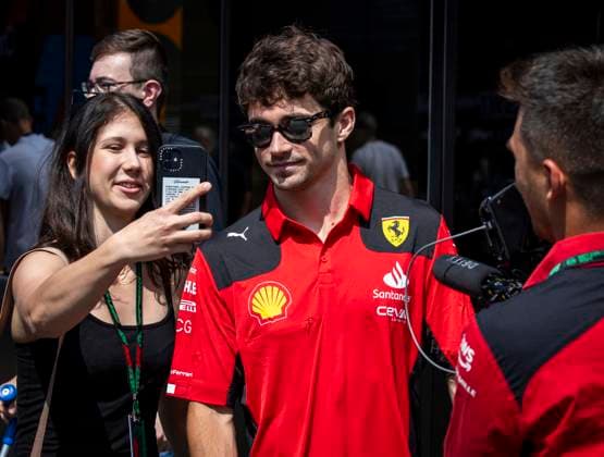 FORMULA 1 - GP of Austria 2023 SPIELBERG,AUSTRIA,30.JUN.23 - MOTORSPORTS, FORMULA 1 - Grand Prix of Austria, Red Bull Ring, practice and qualifying. Image shows Charles Leclerc (MON Ferrari) and a fan.  GEPAxpictures xWolfgangxJannach