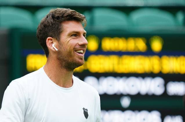Mandatory Credit: Photo by Javier Garcia Shutterstock (13987396j) Cameron Norrie practices wearing an earbud for the Wimbledon official film Wimbledon Tennis Championship Practice and Previews, The All England Lawn Tennis and Croquet Club, London, UK - 30 Jun 2023 Wimbledon Tennis Championship Practice and Previews, The All England Lawn Tennis and Croquet Club, London, UK - 30 Jun 2023  Copyright: xJavierxGarcia Shutterstockx 13987396j