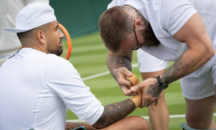 Australian Nick Kyrgios receives treatment during a training session ahead of the 2023 Wimbledon grand slam tennis tournament at the All England Tennis Club, in south-west London, Britain, Saturday 01 July 2023. BENOITxDOPPAGNE  x69842598x
