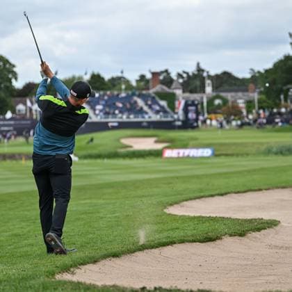 2nd July 2023; The Belfry, Sutton Coldfield, West Midlands, England: Betfred British Masters Golf, Day 4; Grant Forrest hits a long iron to the 18th green from the edge of the bunker  ActionPlus12526233 GodfreyxPitt