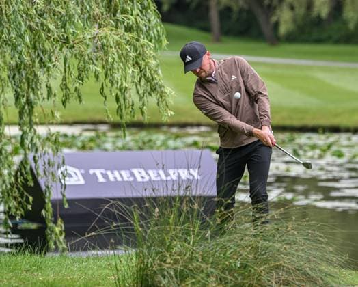 2nd July 2023; The Belfry, Sutton Coldfield, West Midlands, England: Betfred British Masters Golf, Day 4; Richard Mansell chips high onto the green after taking a drop for finding the greenside pond  ActionPlus12526225 GodfreyxPitt