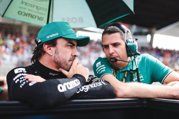FORMULA 1 - GP of Austria 2023 SPIELBERG,AUSTRIA,02.JUL.23 - MOTORSPORTS, FORMULA 1 - Grand Prix of Austria, Red Bull Ring. Image shows Fernando Alonso (ESP Aston Martin) and an engineer.  GEPAxpictures xDanielxGoetzhaber