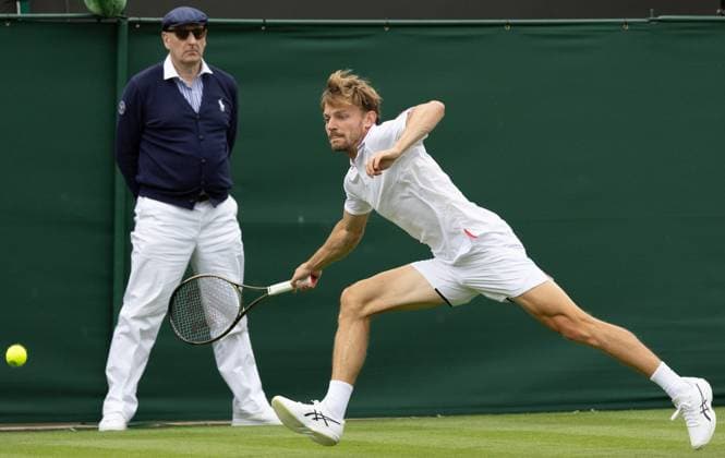 Belgian David Goffin pictured in action during the match between Belgian Goffin and lucky loser Hungarian Marozsan, in the men s Singles First Round, at the 2023 Wimbledon grand slam tennis tournament at the All England Tennis Club, in south-west London, Britain, Monday 03 July 2023. BENOITxDOPPAGNE  x69978888x